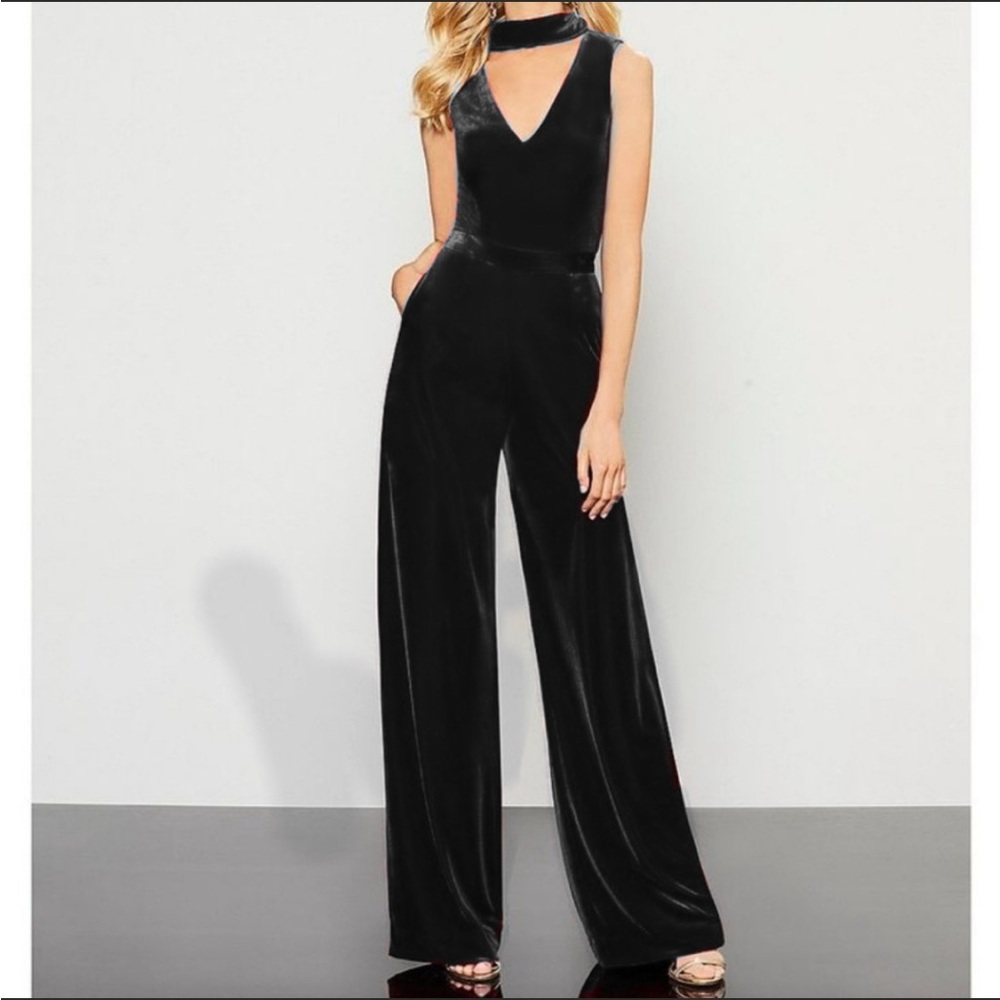 Boutique black velvet jumpsuit size 3